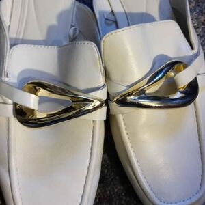 Stylish White Loafers with Gold and Silver Accents